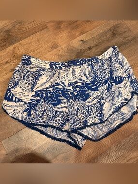 Aerie Blue and White Tropical Print Shorts with blue Pom poms size M
